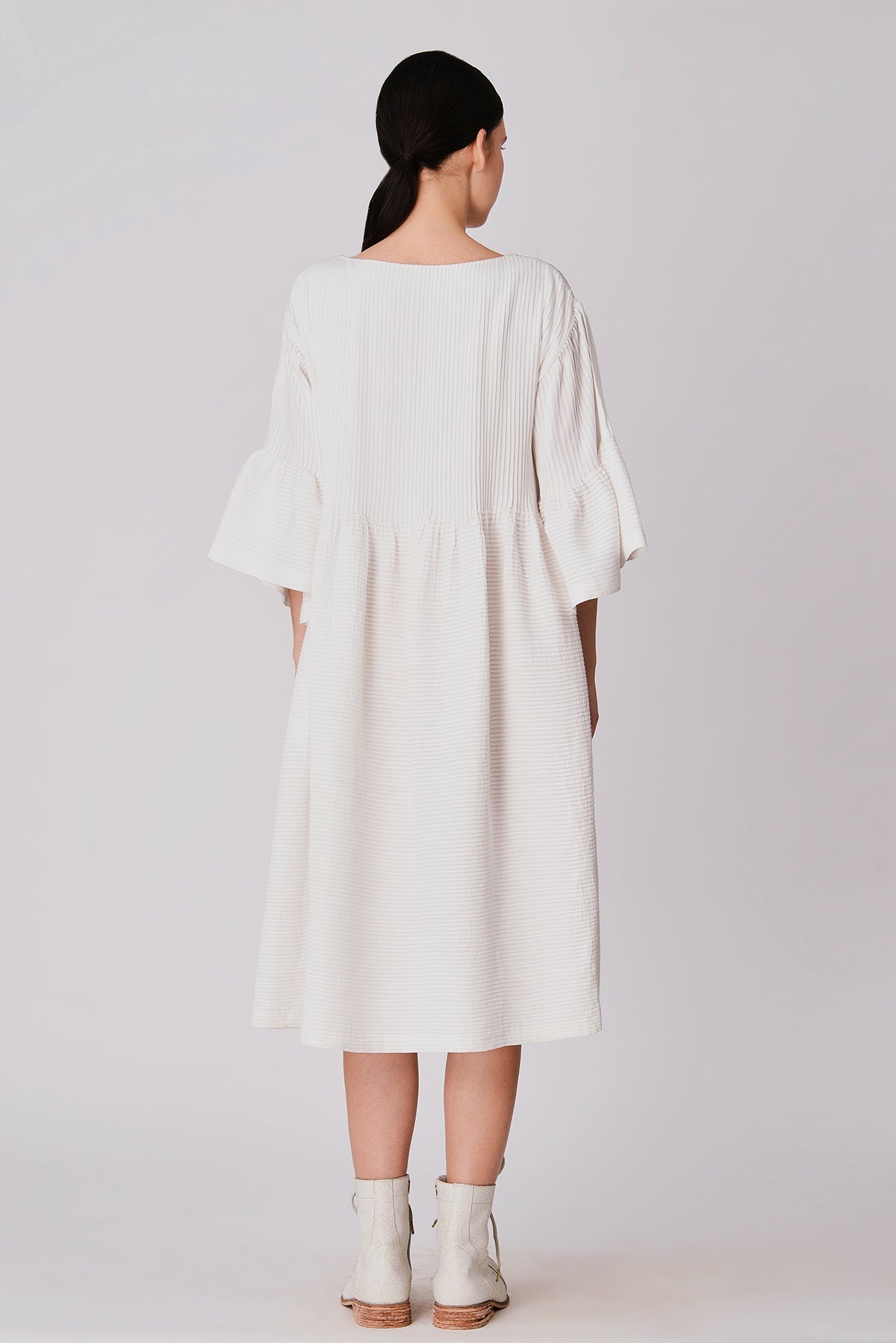 Hamira Peplum Pleated Dress