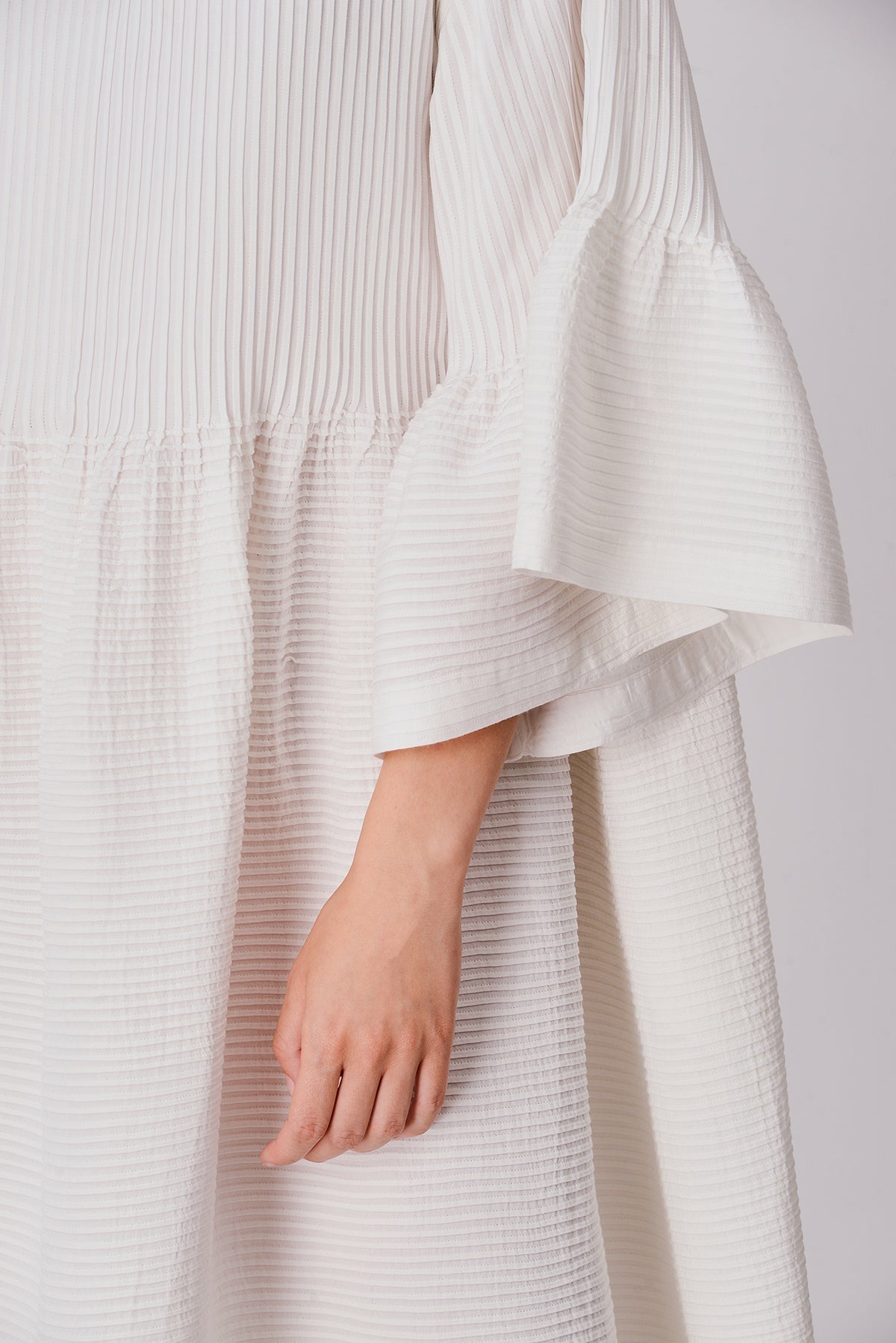 Hamira Peplum Pleated Dress